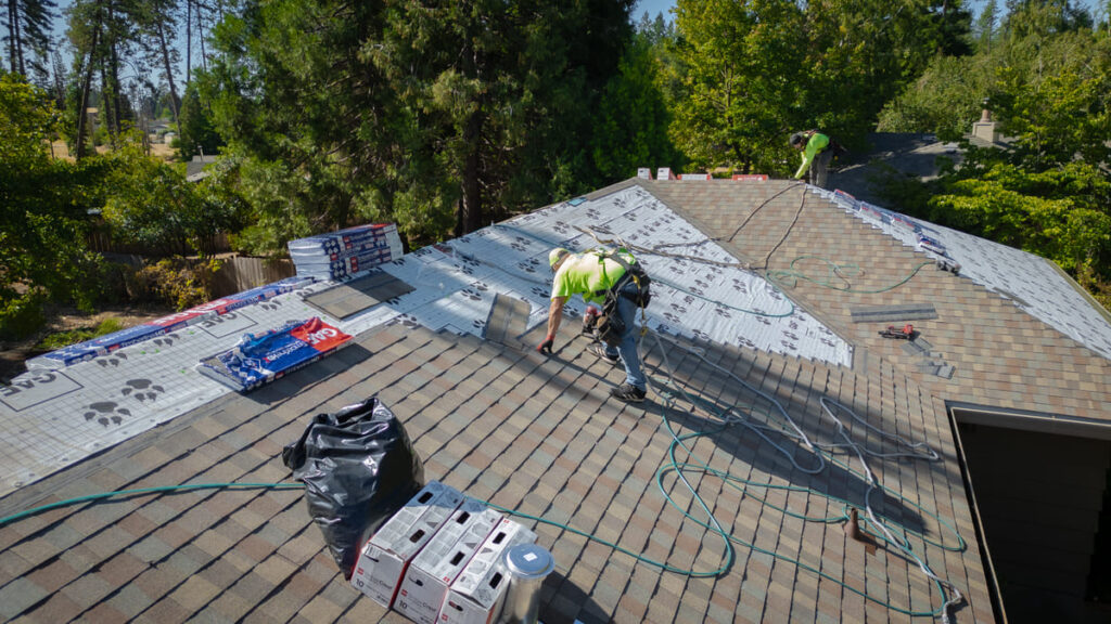 Roof-replacement (1) Butte roofing company crew working on a residential roof replacement in northern california