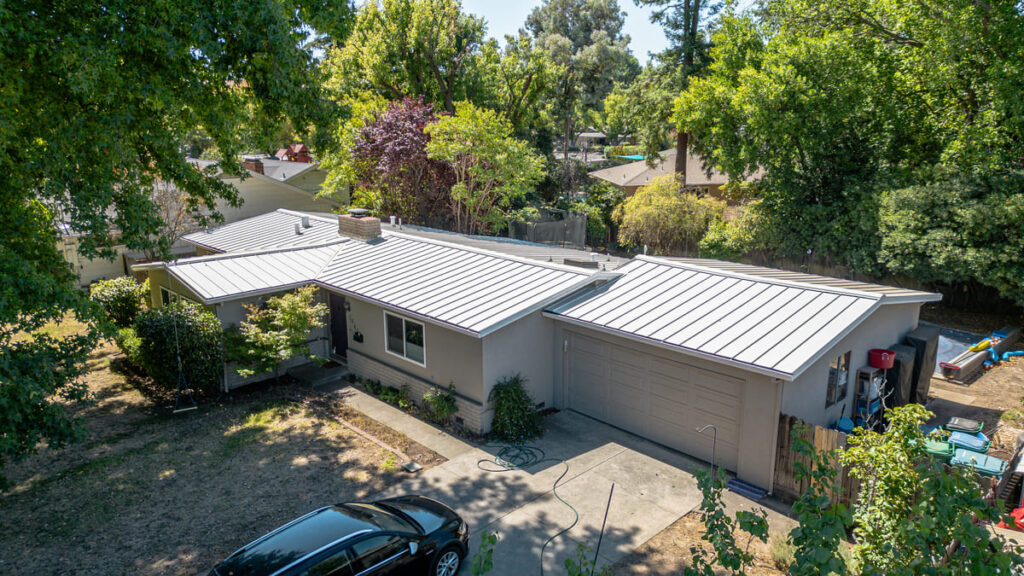 Aerial photo of standing seam metal roof on residential home in northern california installed by butte roofing company